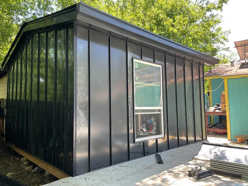 Black standing seam metal wall panels for Roof Inspection in Wauseon